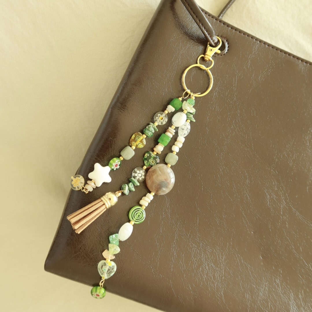 product image of green/beige bag charm